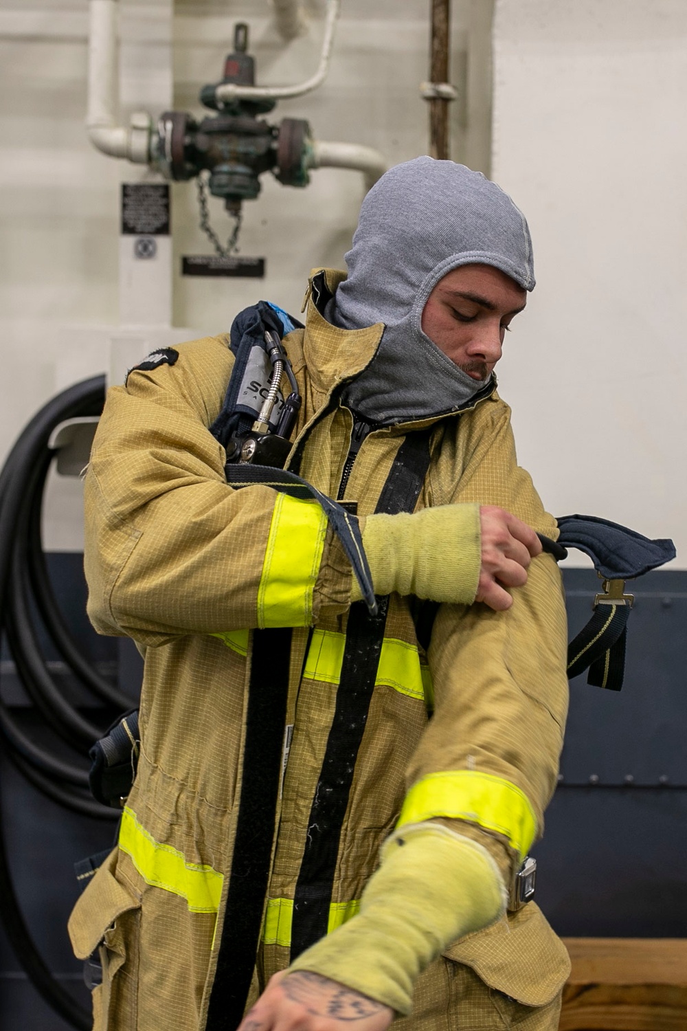 USS Tripoli Conducts Main Space Fire Drill