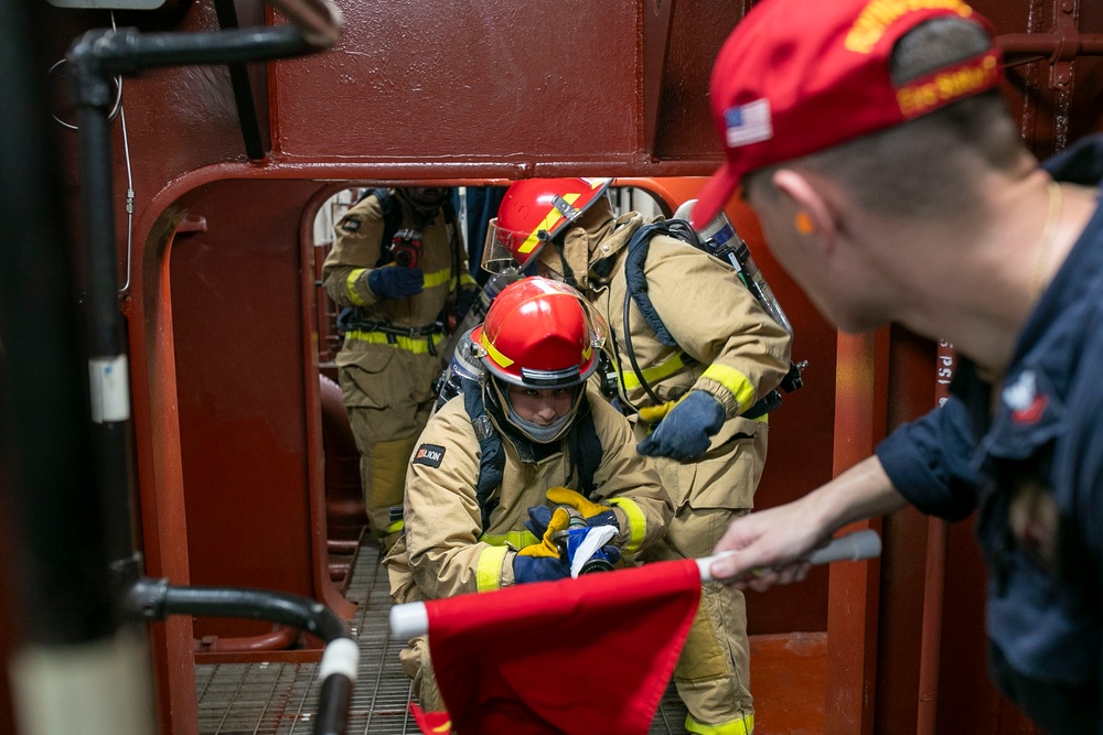 USS Tripoli Conducts Main Space Fire Drill