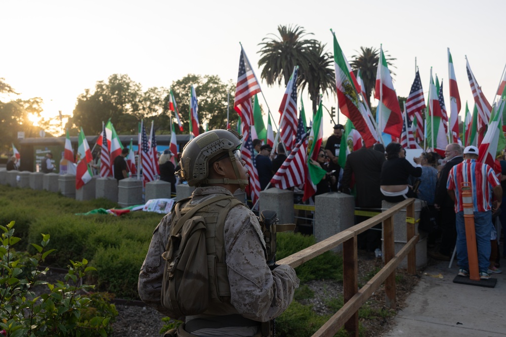 U.S. Marines stand guard around federal building