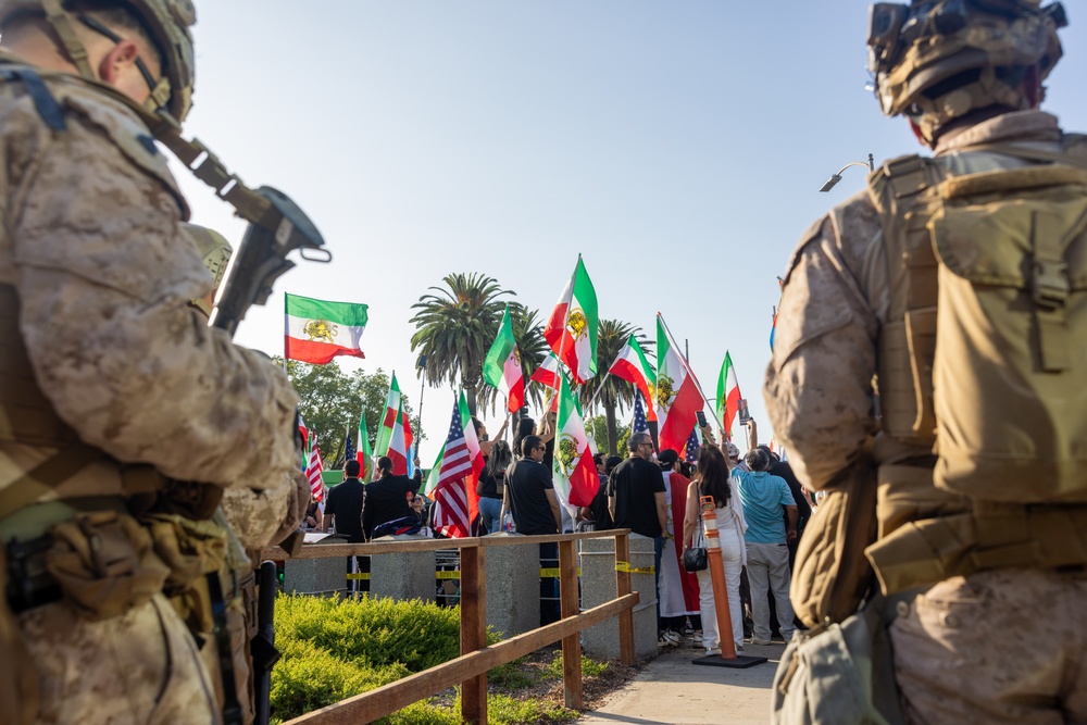 U.S. Marines stand guard around federal building