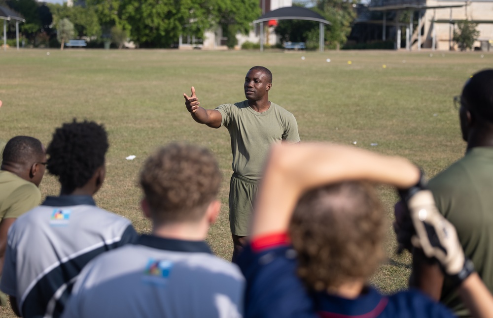 MRF-D 25.3: Marines and Sailors coach a flag football team from Darwin Middle School