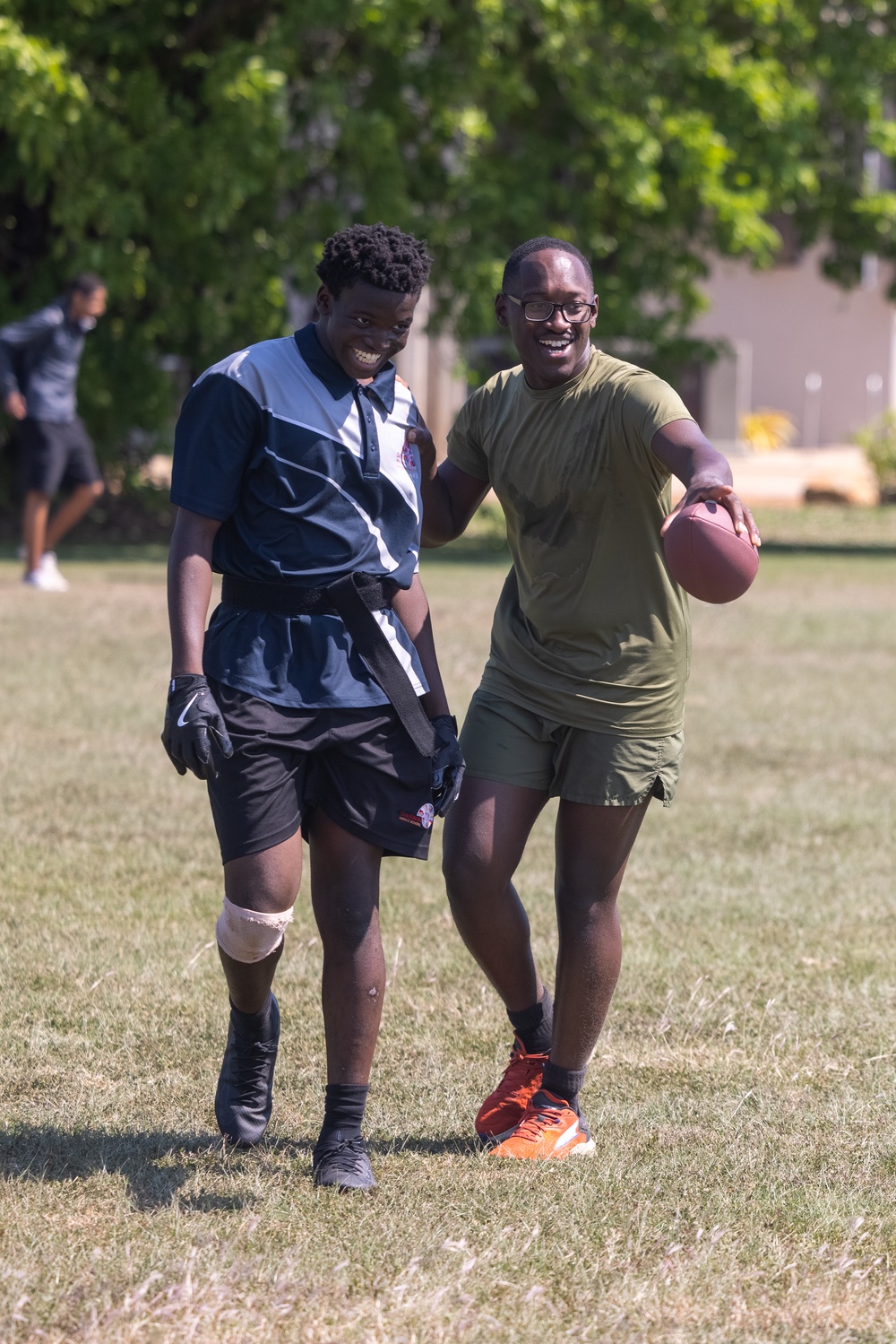 MRF-D 25.3: Marines and Sailors coach a flag football team from Darwin Middle School