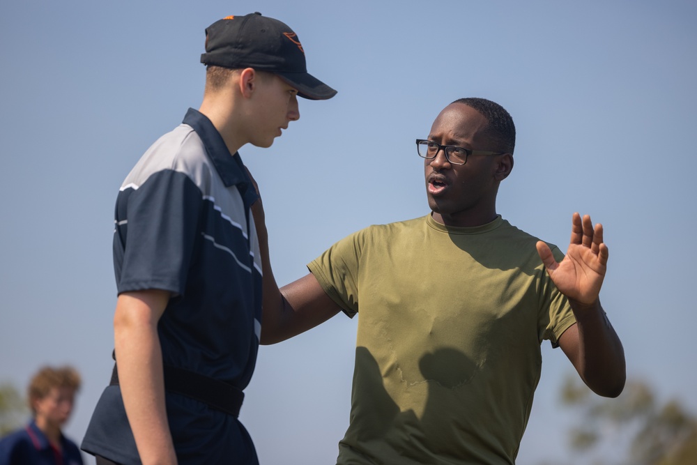 MRF-D 25.3: Marines and Sailors coach a flag football team from Darwin Middle School