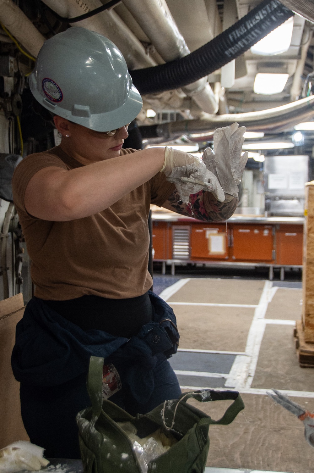 Ronald Reagan Sailor Performs Maintenance