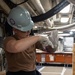Ronald Reagan Sailor Performs Maintenance