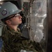 Ronald Reagan Sailor Cleans Glass