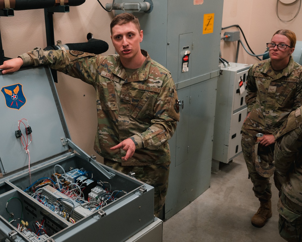 Airmen with previous experience in missile maintenance give tours to airmen from different Air Force Specialty Codes
