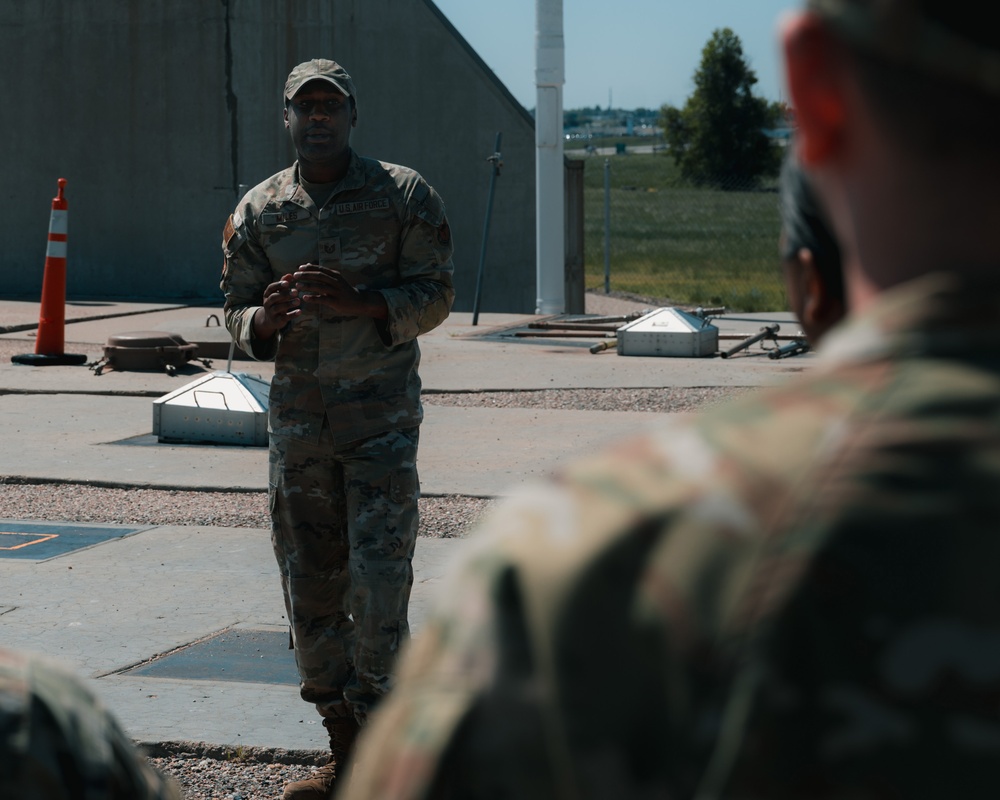 Airmen with previous experience in missile maintenance give tours to airmen from different Air Force Specialty Codes