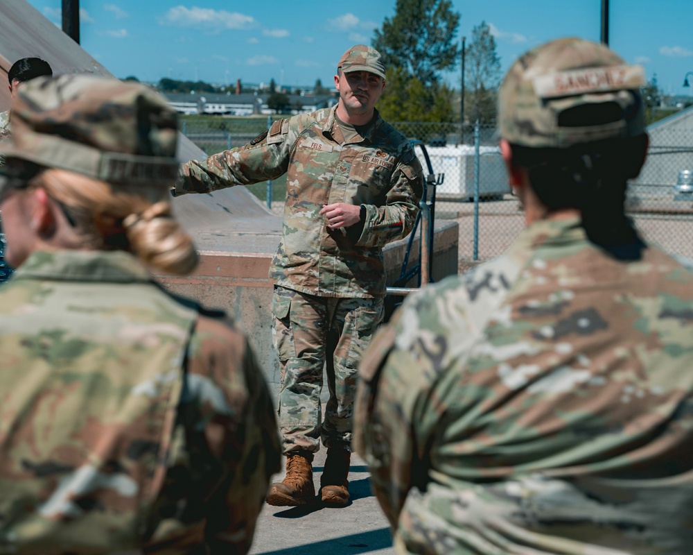 Airmen with previous experience in missile maintenance give tours to airmen from different Air Force Specialty Codes