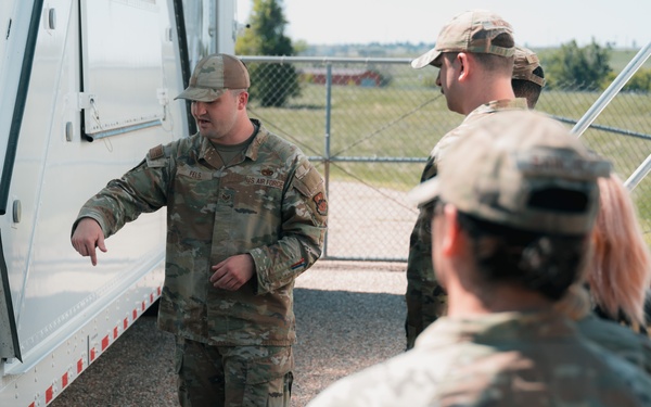 Airmen with previous experience in missile maintenance give tours to airmen from different Air Force Specialty Codes