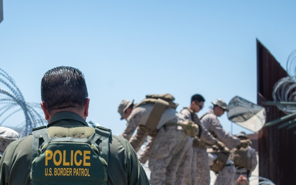 Task Force Sapper Marines speak with U.S. Border Patrol agent