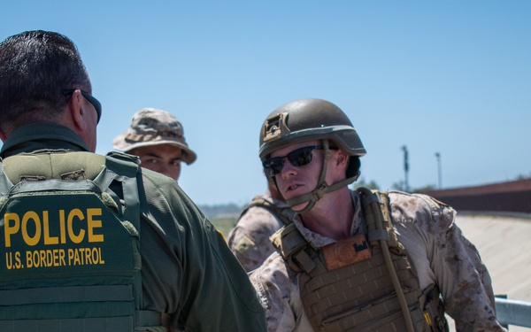 Task Force Sapper Marines speak with U.S. Border Patrol agent