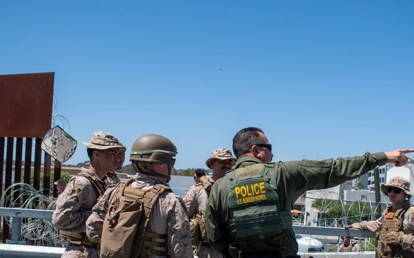 Task Force Sapper Marines speak with U.S. Border Patrol agent