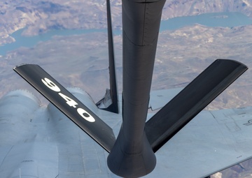 C-135 Stratotanker refuels F-15E Strike Eagle