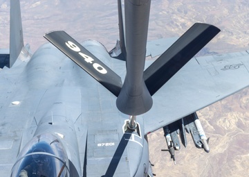 KC-135 Stratotanker refuels F-15E Strike Eagle