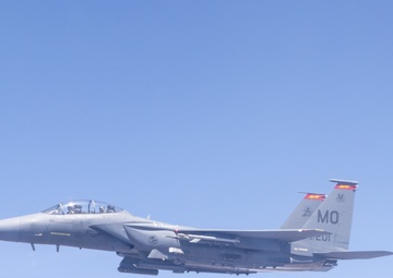 KC-135 Stratotanker refuels F-15E Strike Eagle
