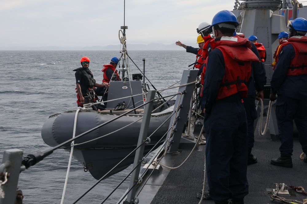 Sailors aboard the USS John Finn conduct a small boats operation in Sagami Wan