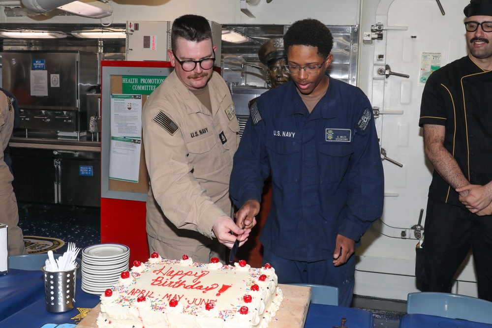 Sailors aboard the USS John Finn hold a birthday celebration in Sagami Wan