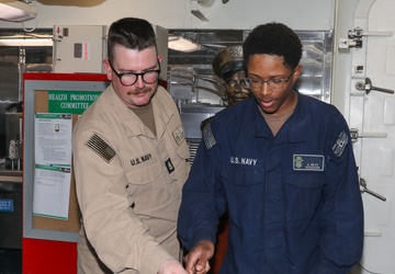 Sailors aboard the USS John Finn hold a birthday celebration in Sagami Wan