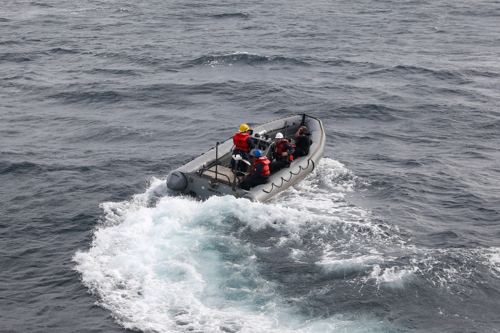 Sailors aboard the John Finn conduct a small boat operation in Sagami Wan