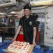 Sailors aboard the USS John Finn hold a birthday celebration in Sagami Wan