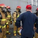 Sailors aboard the USS John Finn conduct a firefighting drill in Sagami Wan