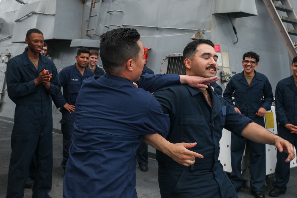 Sailors aboard the USS John Finn conduct a security reaction force class in Sagami Wan