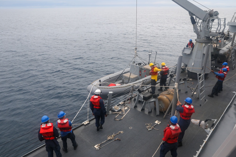 Sailors aboard the USS John Finn conduct a small boat operation in Sagami Wan