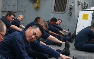 Sailors aboard the USS John Finn conduct a security reaction force class in Sagami Wan