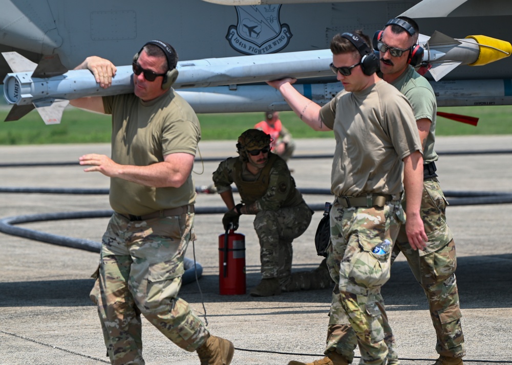 Expanding Joint Integrated Capabilities: 158th Fighter Wing, 104th Fighter Wing, 439th Airlift Wing, and 103rd Airlift Wing Execute Rapid Rearming and Refueling Exercises