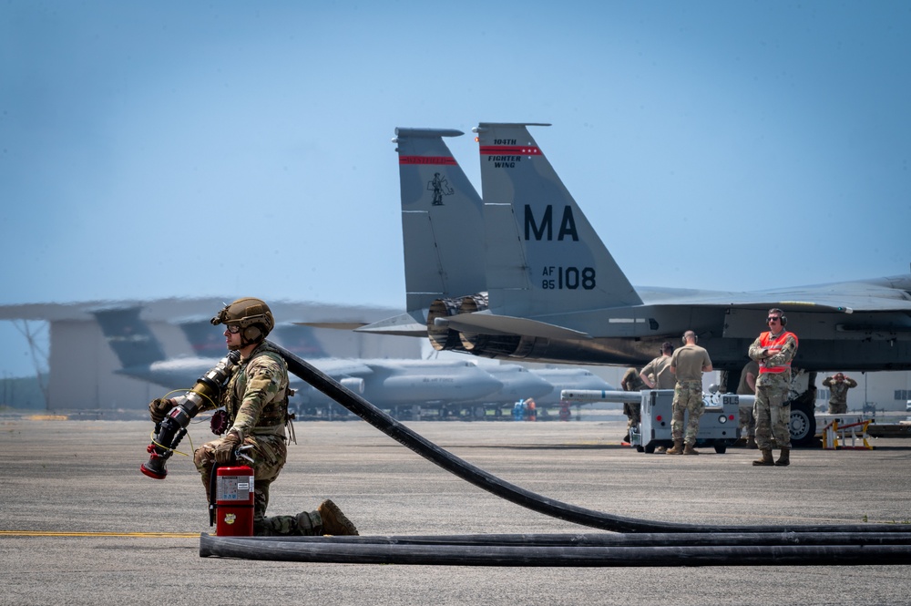 Expanding Joint Integrated Capabilities: 158th Fighter Wing, 104th Fighter Wing, and 103rd Airlift Wing Execute Rapid Rearming and Refueling Exercises