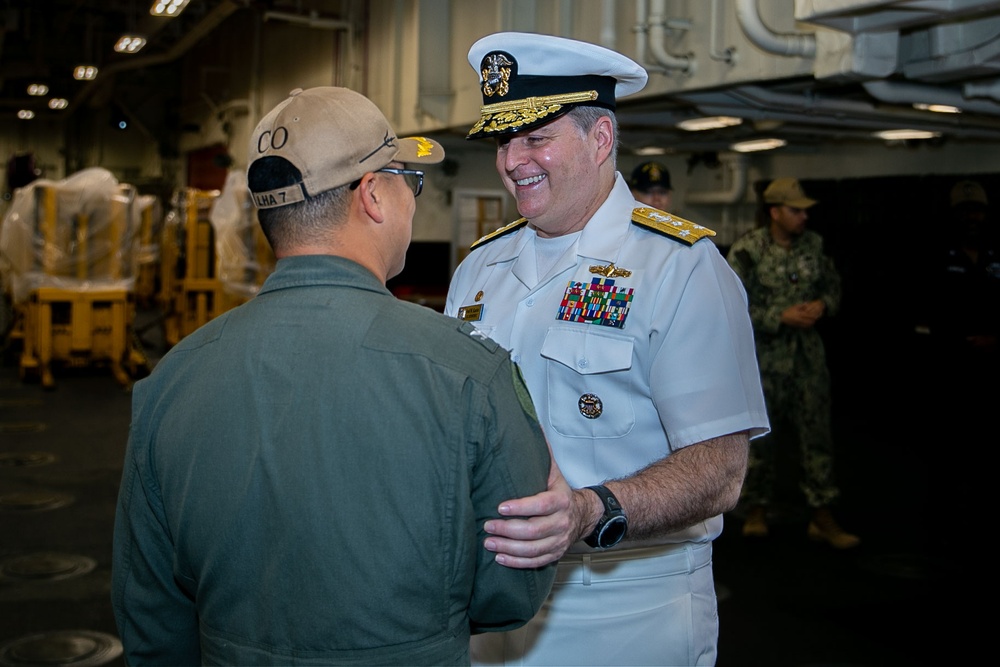 Vice Adm. Fred W. Kacher, commander, U.S. 7th Fleet, visits USS Tripoli (LHA 7)