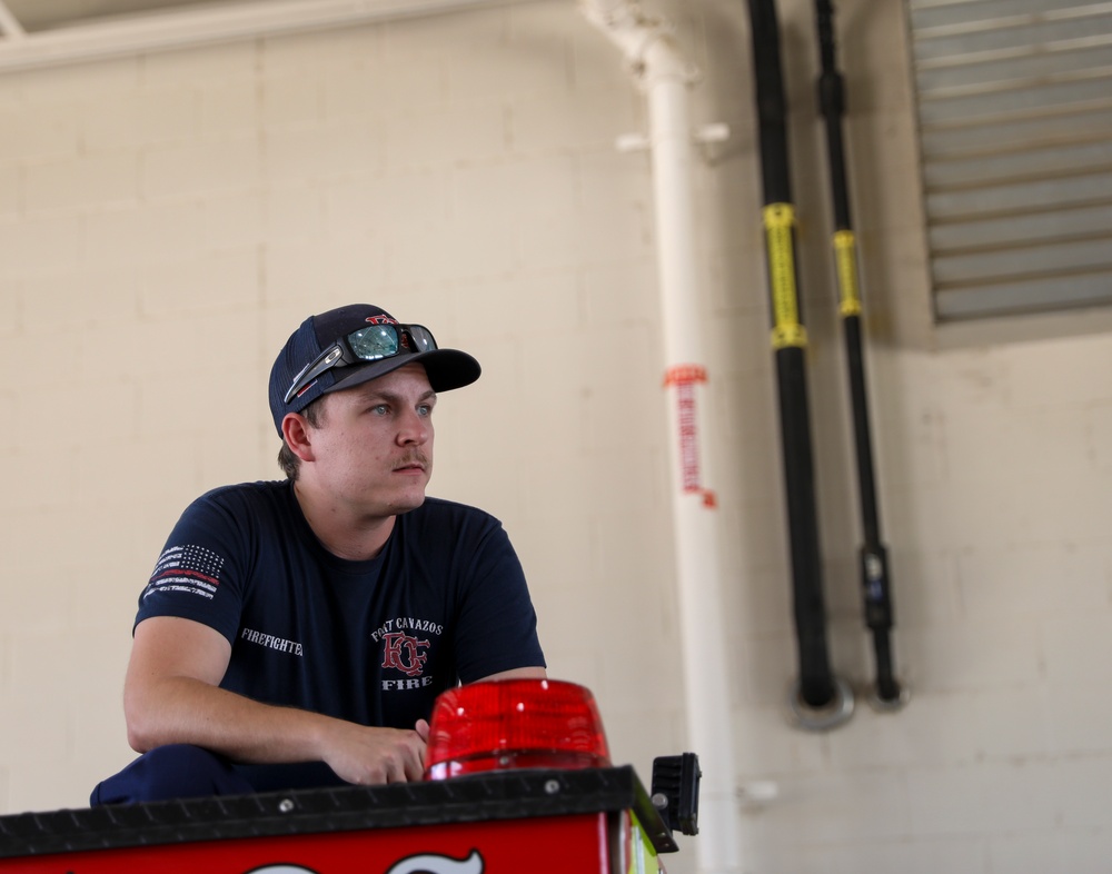 Firefighter Joshua Bertelson participates in briefing