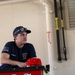 Firefighter Joshua Bertelson participates in briefing