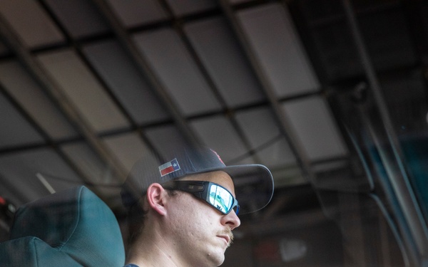 Firefighter Joshua Bertelson operates the Aircraft rescue and firefighting striker