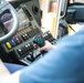 Firefighter Joshua Bertelson operates the water head of the aircraft rescue and firefighting striker