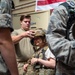 Civil Air Patrol Cadet tries on EOD Bomb Suit