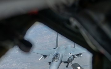KC-135 Stratotanker delivers fuel to F-15E Strike Eagle