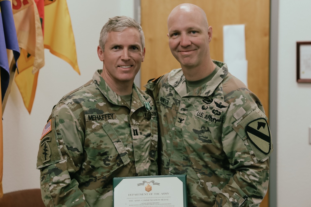 Air Cav Soldiers from 2-227 Aviation Regiment are recognized during an award ceremony.