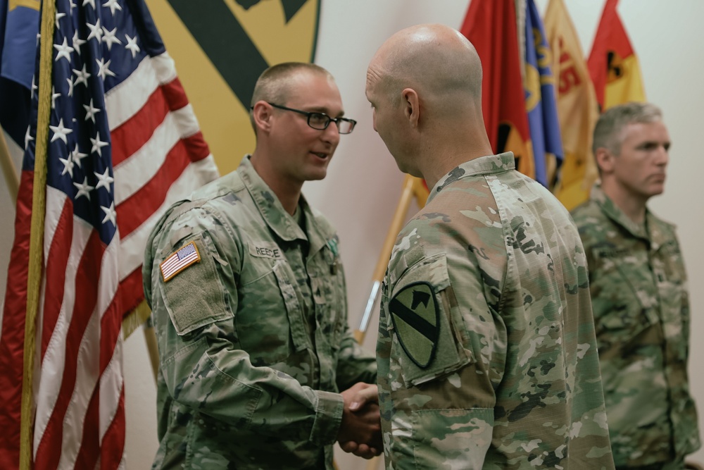 Air Cav Soldiers from 2-227 Aviation Regiment are recognized during an award ceremony.