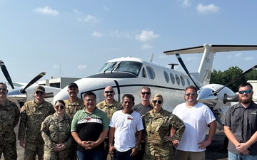 Chief Warrant Officer Circles the Globe in C-12 Huron