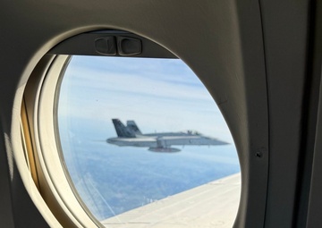 Chief Warrant Officer Circles the Globe in C-12 Huron