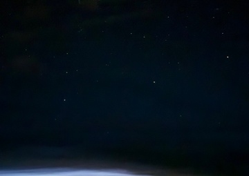 Chief Warrant Officer Circles the Globe in C-12 Huron