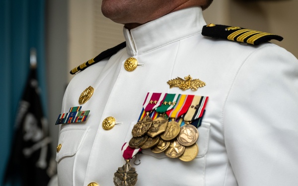 CDR Sapienza relieves CDR Brinkman (NMCB-3)