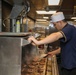 Sailors aboard the USS John Finn prepare lunch in Sagami Wan