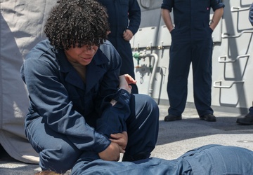 Sailors aboard the USS John Finn conduct a security reaction force class in Sagami Wan