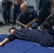 Sailors aboard the USS John Finn conduct a security reaction force class in the Philippine Sea
