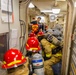 Iwo Jima Sailors Conduct Damage Control Drill