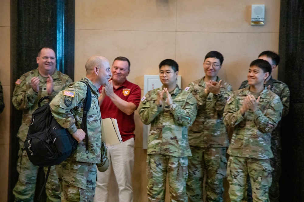Brigadier General Roderick F. Laughman receives clap-out