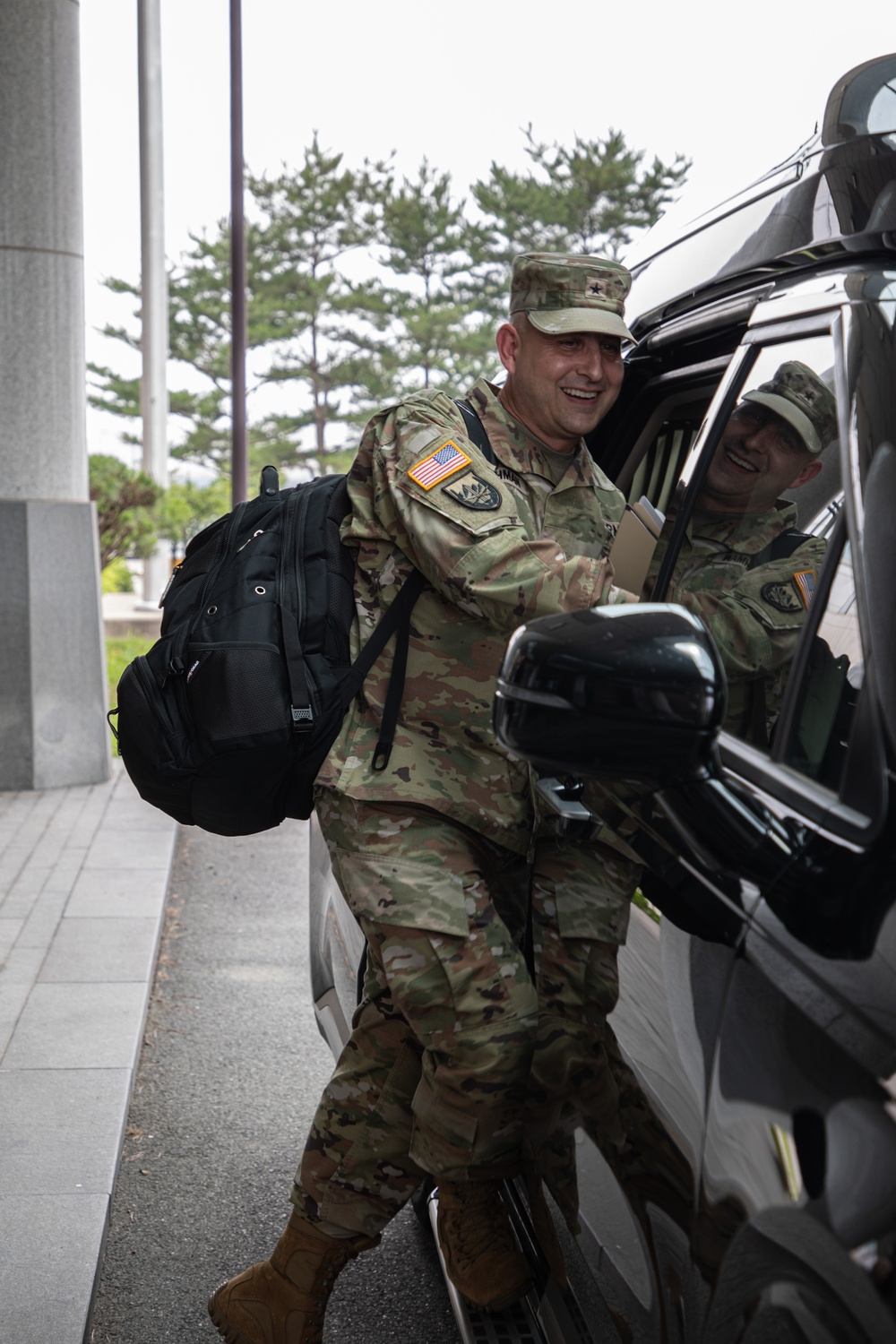 Brigadier General Roderick F. Laughman receives clap-out